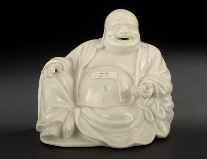 Appraisal: Chinese Blanc-de-Chine Porcelain Figure of Pu-Tai th century the seated