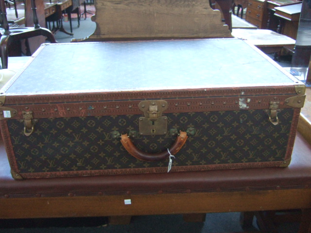 Appraisal: A Louis Vuitton cabin trunk with gilt detailed faux leather