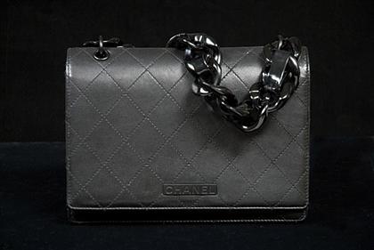 Appraisal: Chanel matte black quilted leather purse Contemporary design with black