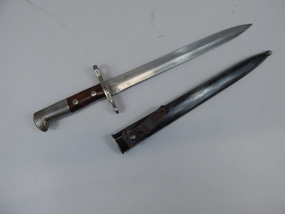 Appraisal: A German bayonet the blade stamped Elsener Schwyz numbered with