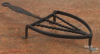 Appraisal: Wrought iron trivet th c '' l together with a