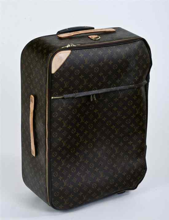 Appraisal: LOUIS VUITTON BROWN LEATHER ROLLING SUITCASE Coated canvas and vachetta