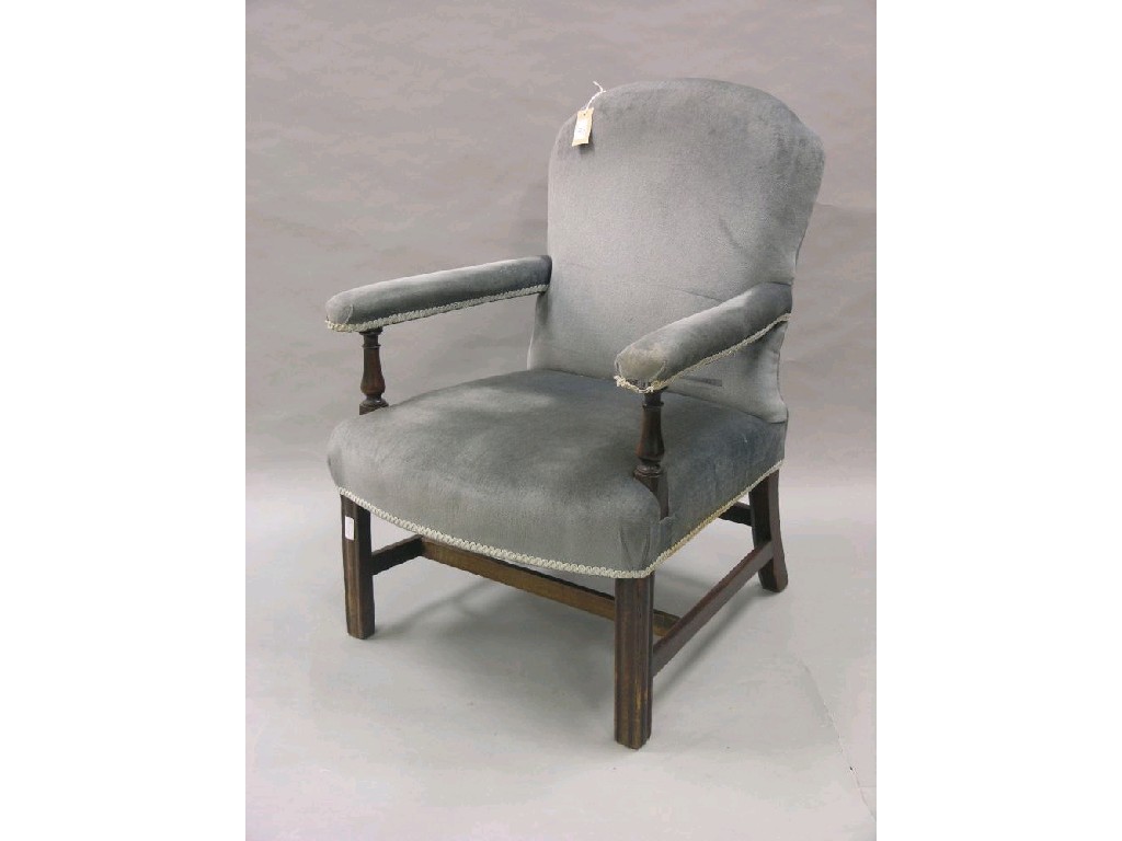 Appraisal: A Chippendale period mahogany low armchair with turned arm supports