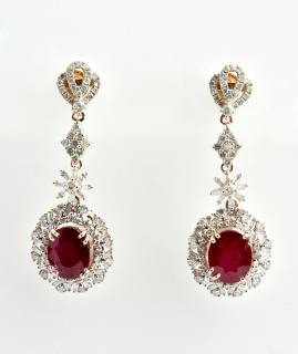 Appraisal: Pair of K Pierced Earrings with diamond mounted studs and