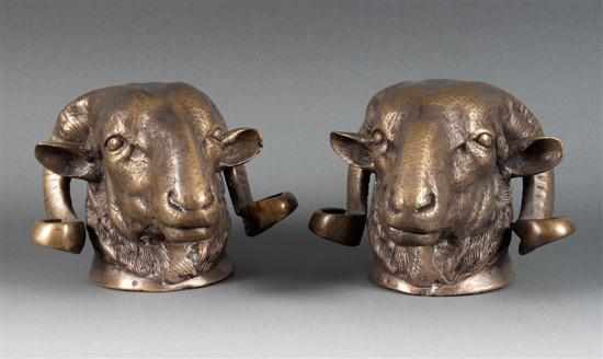 Appraisal: Pair of Continental cast bronze ram's heads th century in