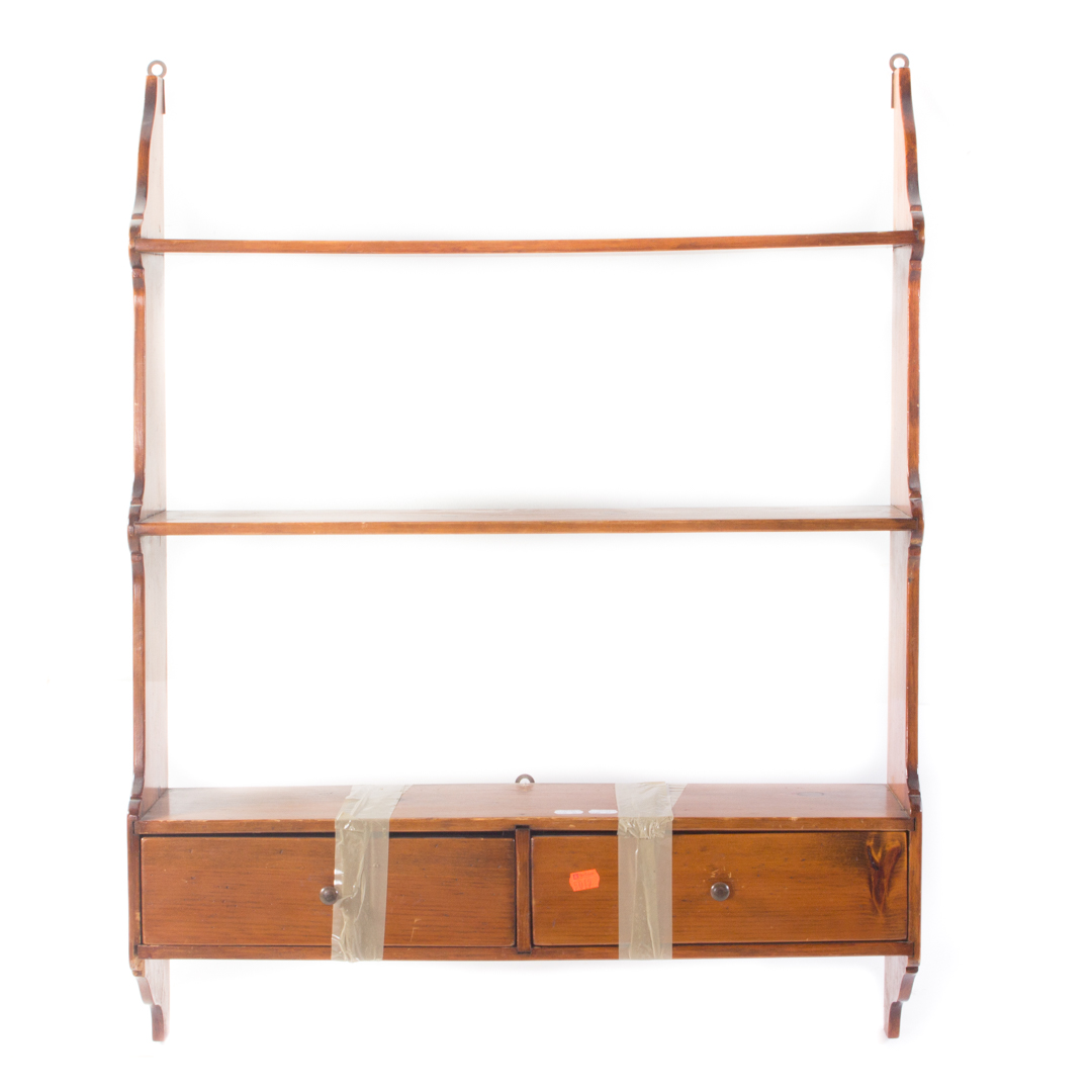 Appraisal: American vernacular pine wall shelf three shelves over a pair