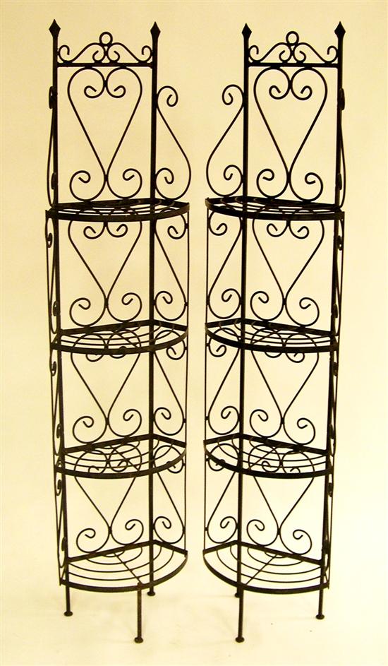 Appraisal: Pair of wrought iron four tier corner shelves scrolled sides