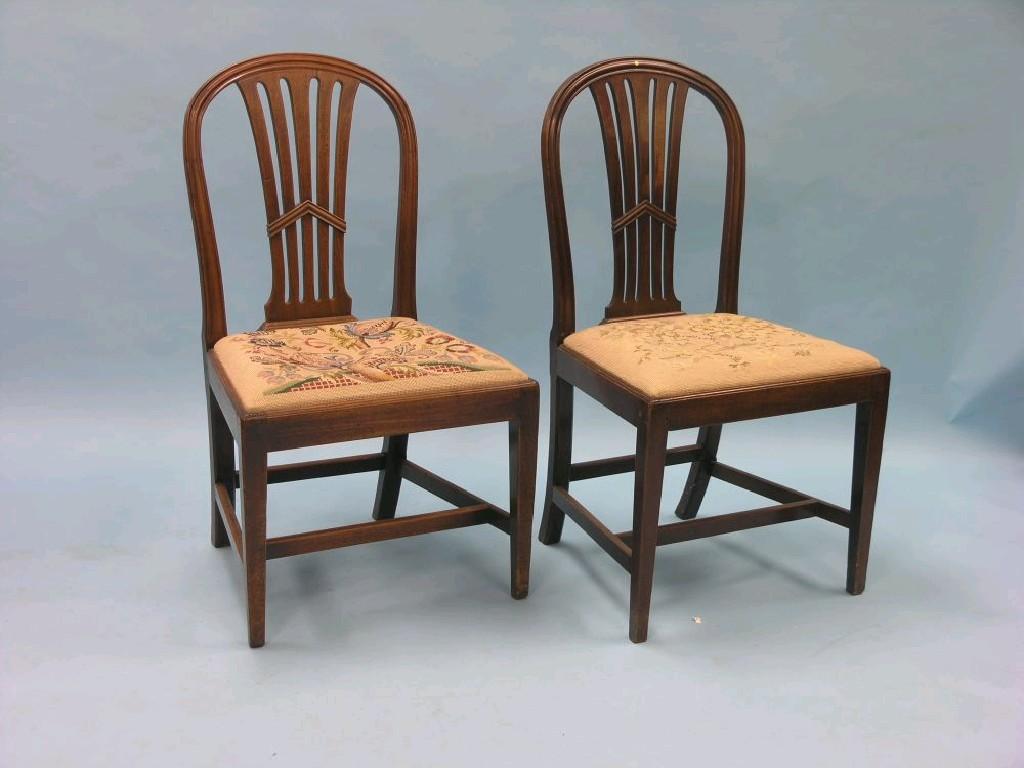 Appraisal: A set of seven Hepplewhite-period mahogany dining chairs moulded and