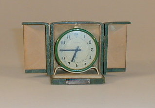 Appraisal: A mid thC travel clock the circular dial signed Le