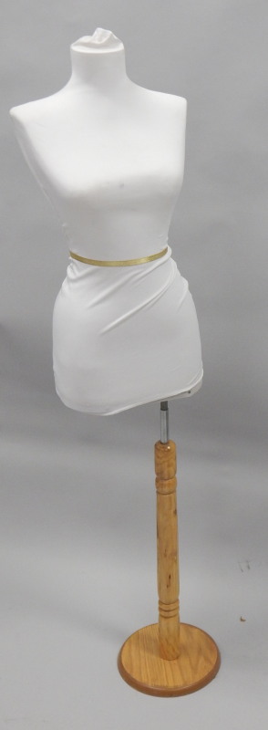 Appraisal: A modern mannequin on a pine base