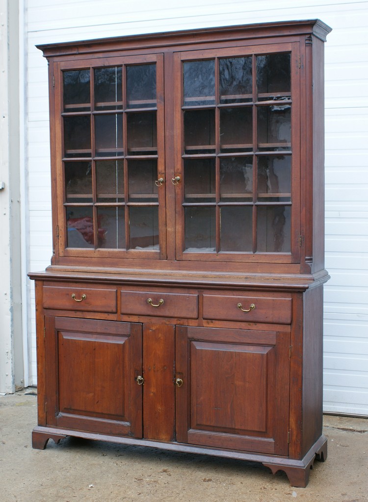 Appraisal: pc PA walnut stepback cupboard top with pane doors flanked