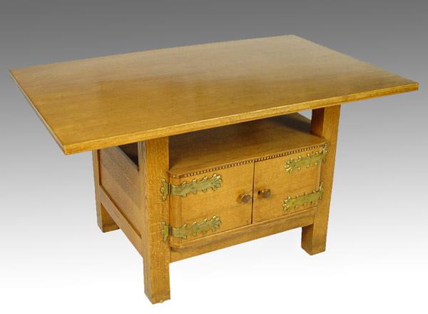 Appraisal: AESTHETIC MOVEMENT GOLDEN OAK CENTER TABLE door storage compartment base