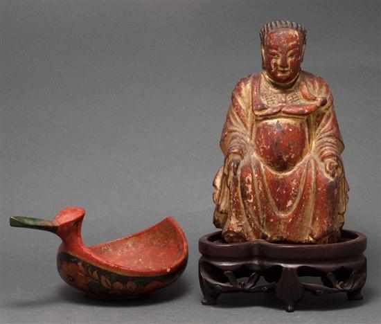 Appraisal: Japanese painted parcel giltwood Buddha figure and a Russian polychromed