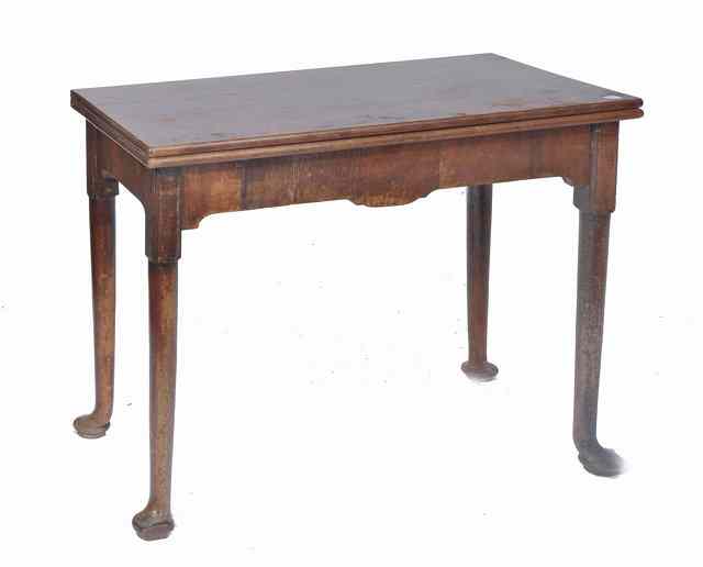 Appraisal: A GEORGIAN MAHOGANY RECTANGULAR TOPPED FOLD OVER TEA TABLE standing