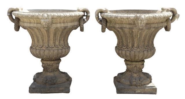 Appraisal: pair Cast stone campana-form garden urns thc flared rim foliated