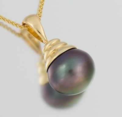 Appraisal: A Tahitian Pearl Necklace k yellow gold pendant set with