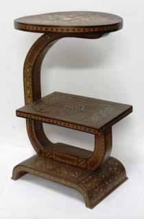 Appraisal: Moroccan Mother The two-tiered table with circular top and rectangular