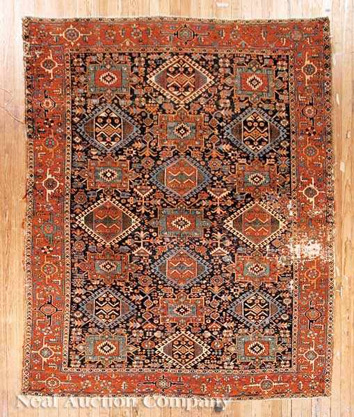 Appraisal: An Antique Persian Carpet c rust and dark blue ground