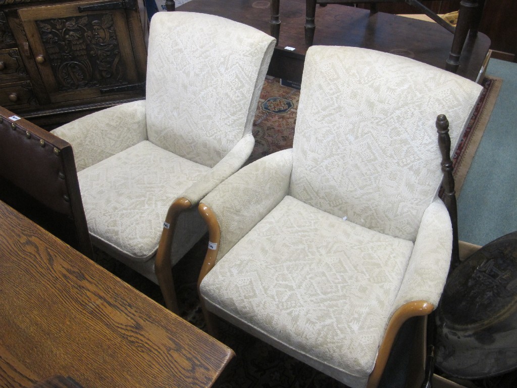 Appraisal: Pair of upholstered fireside armchairs