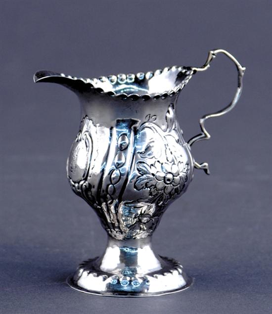 Appraisal: Georgian sterling creamer mid th centuryfloral chased vasiform with beaded