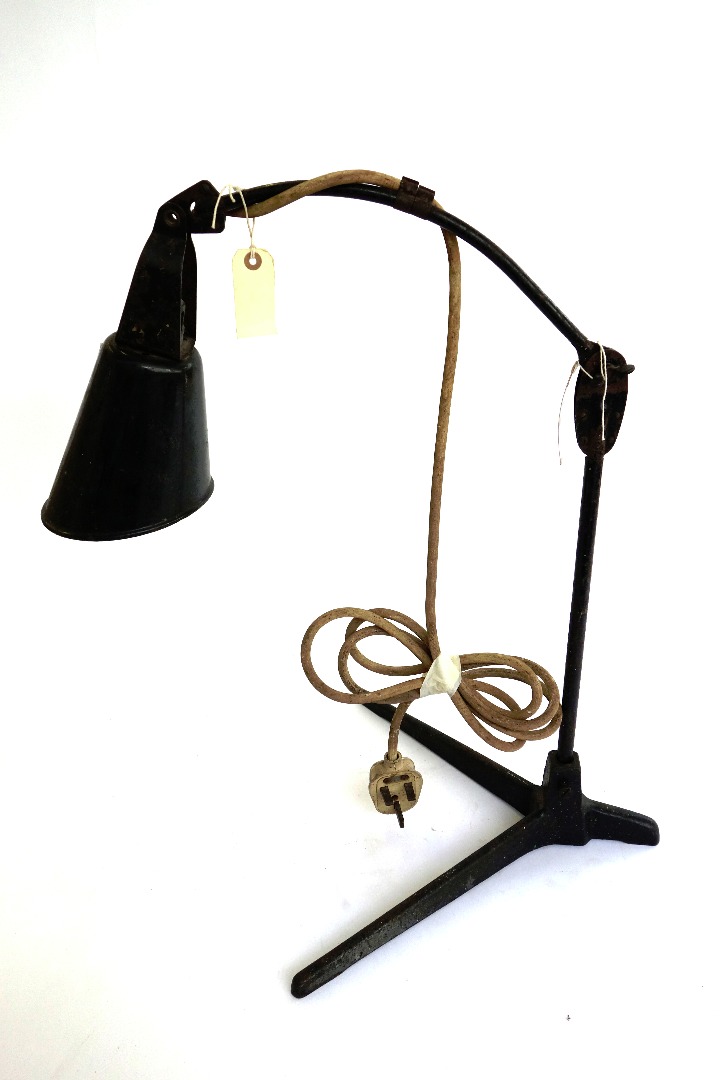 Appraisal: A vintage black painted industrial metal desk lamp the angular