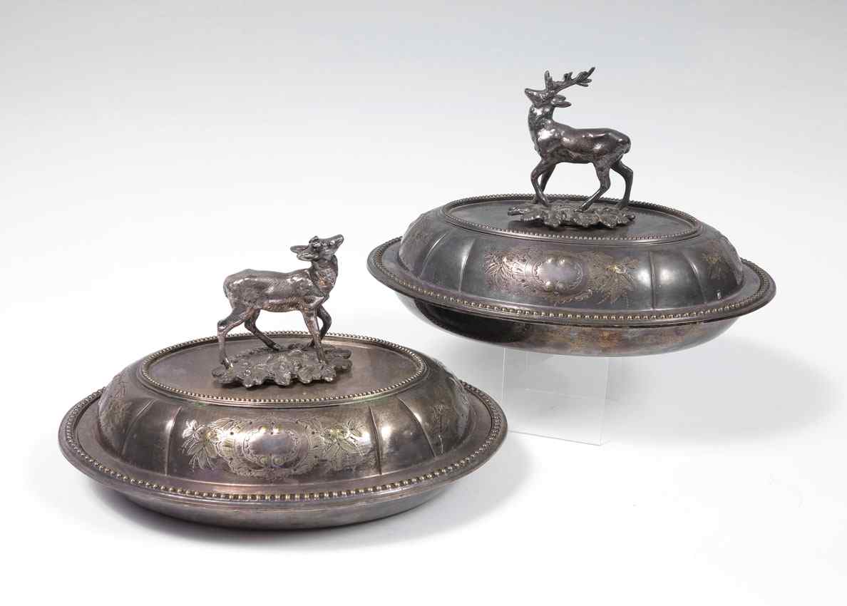 Appraisal: PAIR SILVERPLATE COVERED VEGETABLE WITH DEER FINIALS Pair of Victorian