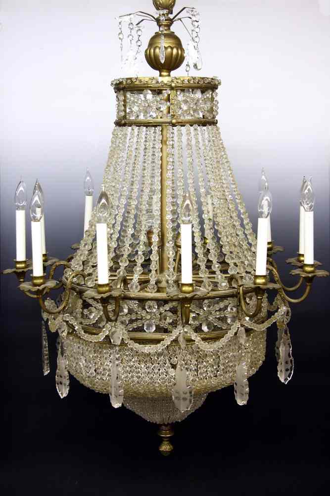 Appraisal: CHANDELIER - Ca - brass framed twelve arm chandelier profusely