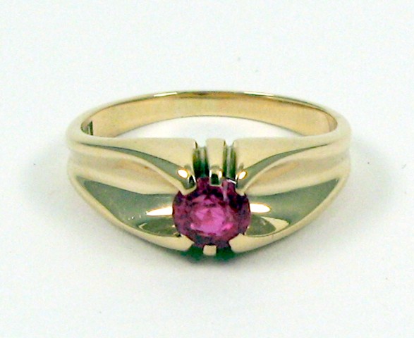 Appraisal: SYNTHETIC RUBY AND TEN KARAT GOLD RING centered and prong