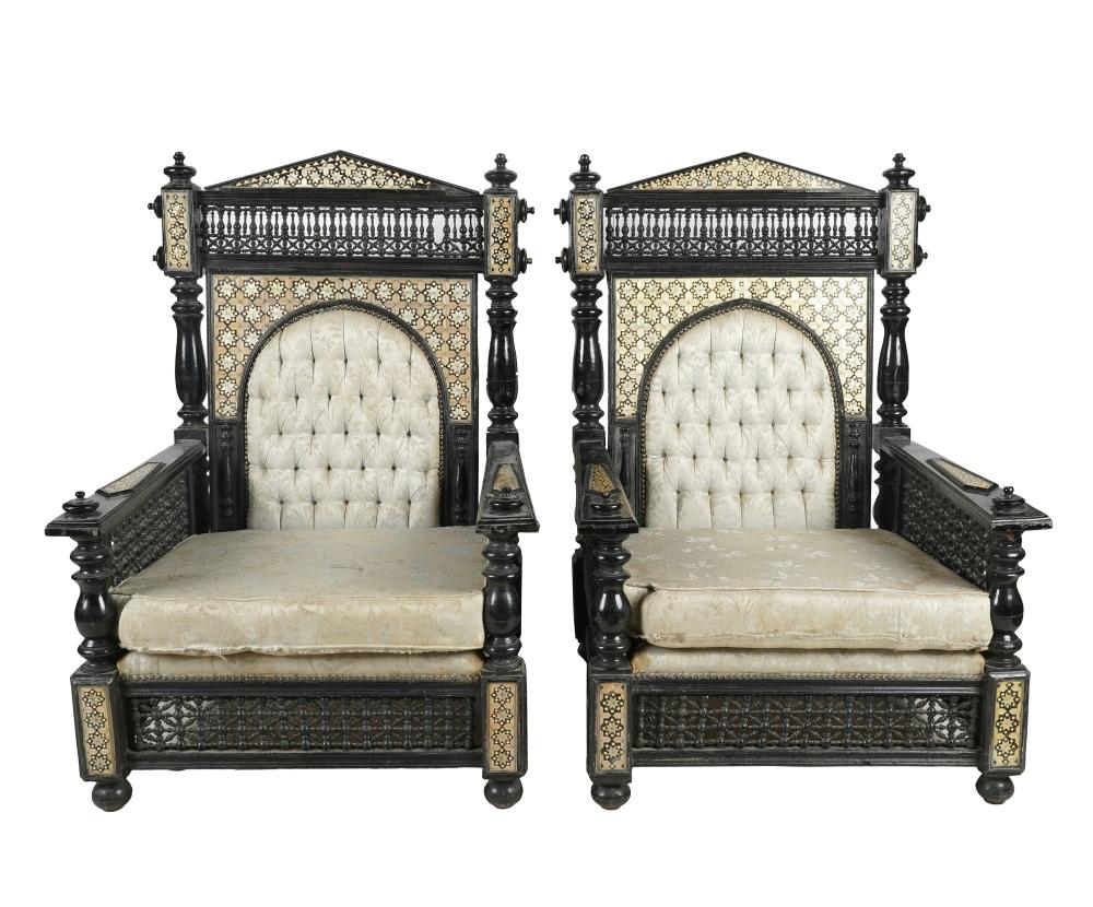 Appraisal: PAIR OF LEVANTINE STYLE THRONE CHAIRScarved ebonized and inlaid wood