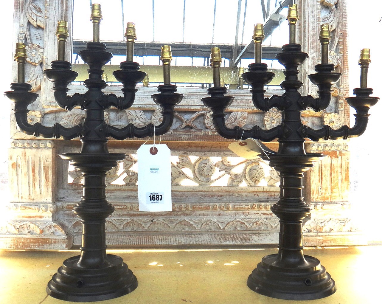 Appraisal: A pair of bronze five light candleabra in the Gothic