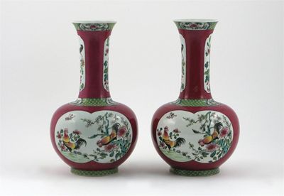 Appraisal: A pair of Samson bottle vases each decorated with panels