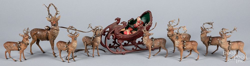 Appraisal: Hubley cast iron sleigh together with reindeer Hubley cast iron