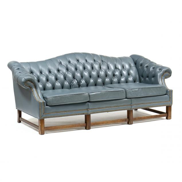 Appraisal: CHIPPENDALE STYLE LEATHER UPHOLSTERED SOFA Circa labeled Flexsteel colonial blue