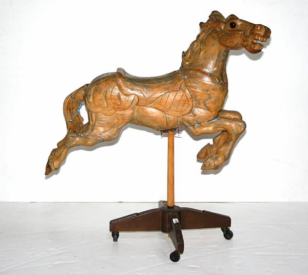 Appraisal: A painted carousel horse on metal stand th century total