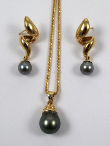 Appraisal: PEARL PENDANT NECKLACE AND EARRINGS each set with a gray