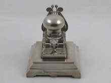 Appraisal: A Russian frosted silver inkwell with lyre pen support maker