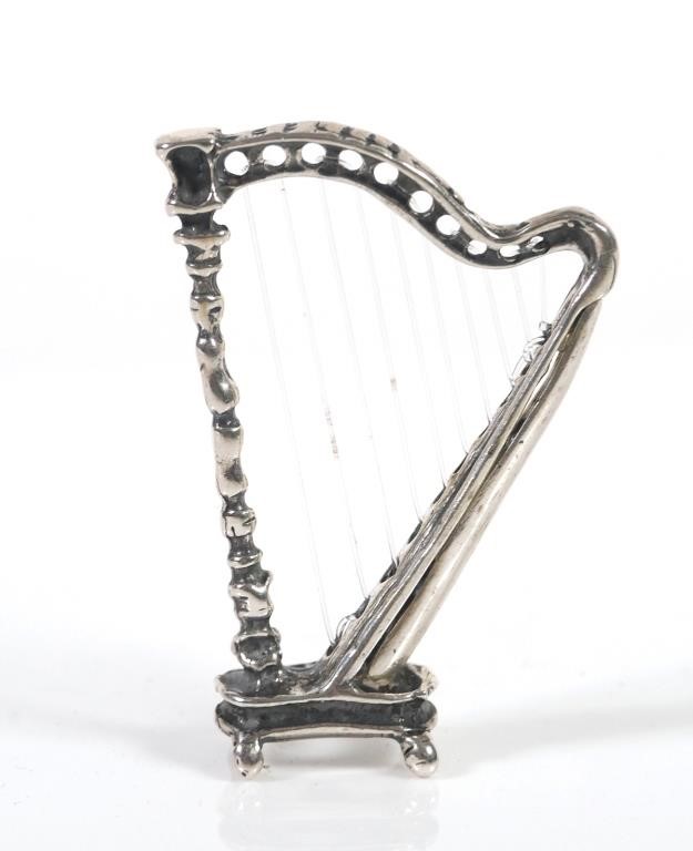 Appraisal: Vintage sterling silver miniature harp with strings No hallmarks found