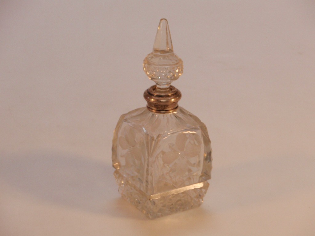 Appraisal: A cut glass scent bottle with silver collar cm high