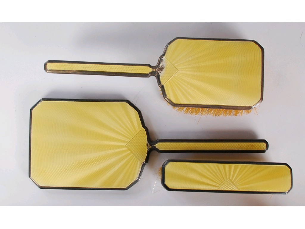 Appraisal: GEORGE V THREE PIECE SILVER AND YELLOW GUILLOCHE ENAMELLED DRESSING