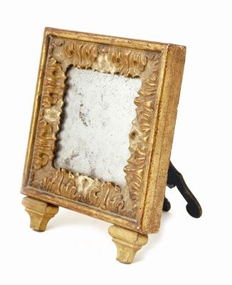 Appraisal: An Italian giltwood and gesso small easel back mirror with