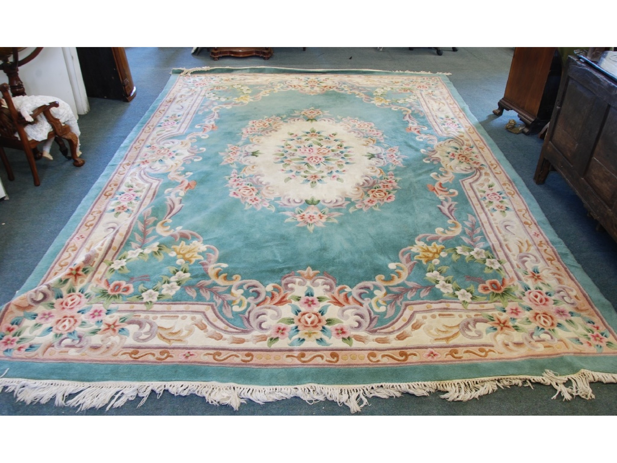 Appraisal: A CHINESE CARPET OF AUBUSSON DESIGN with large off white