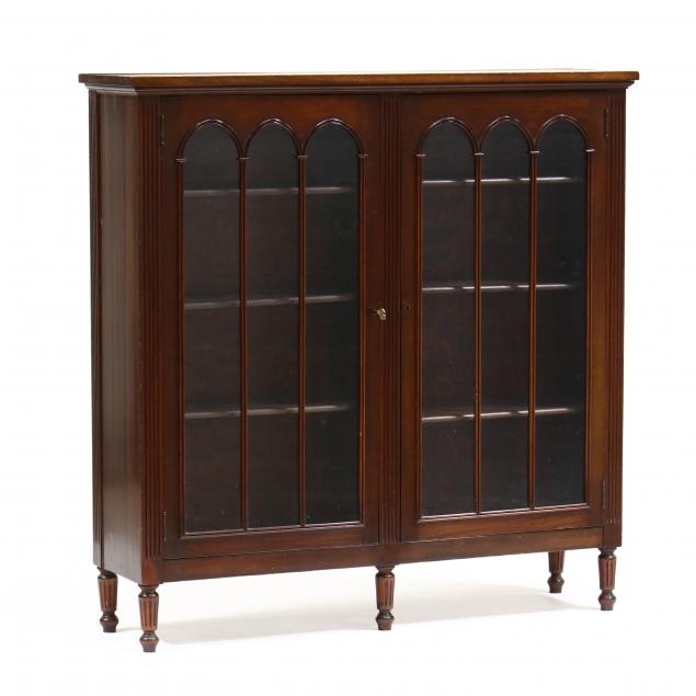 Appraisal: EDWARDIAN MAHOGANY BOOKCASE Early th century labeled Charak Furniture two