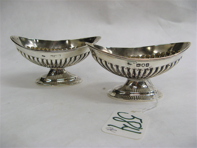 Appraisal: PAIR LONDON STERLING SILVER SALT CELLARS hallmarked British Sterling city