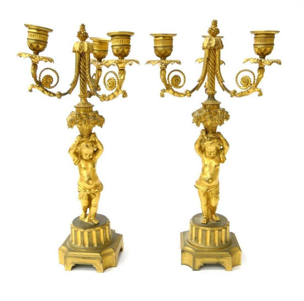 Appraisal: Pr FRENCH DORE BRONZE FIGURAL CHERUB CANDELABRA A pair of