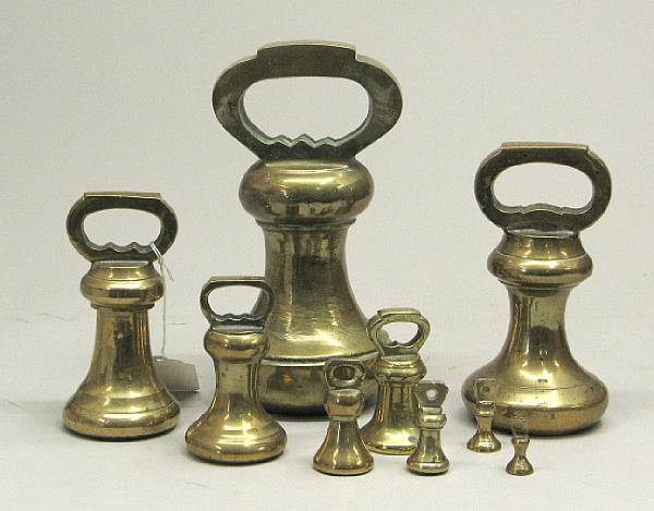 Appraisal: An assembled graduated set of English brass bell weights late