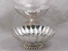 Appraisal: An American silver plated scalloped oval footed bowl by Reed