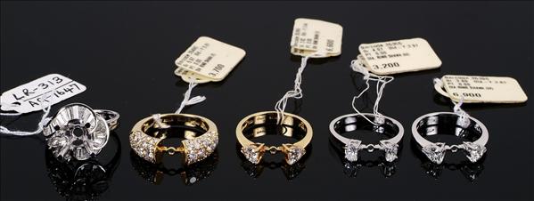 Appraisal: A collection of five diamond set ring mounts including one