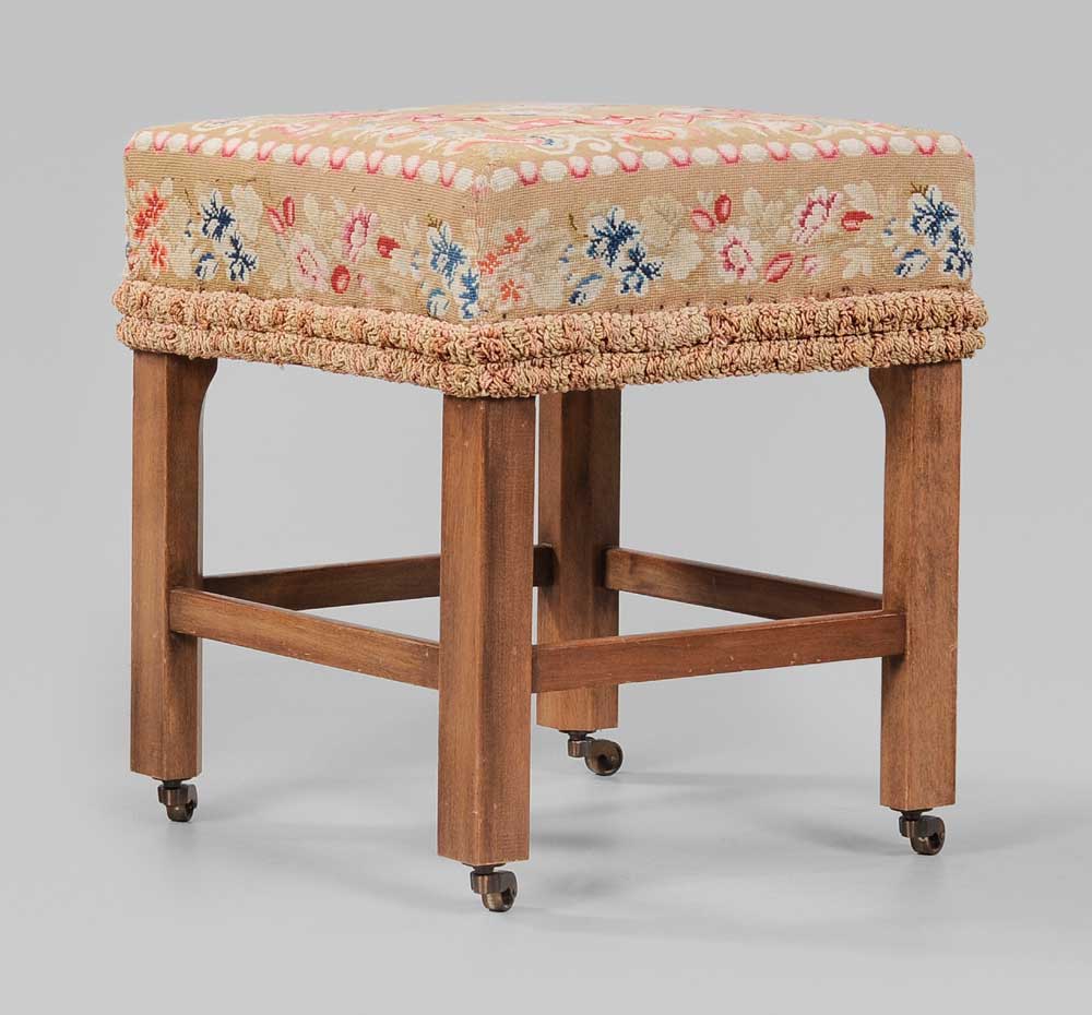 Appraisal: Needlework Upholstered Footstool th century mahogany frame with floral needlework