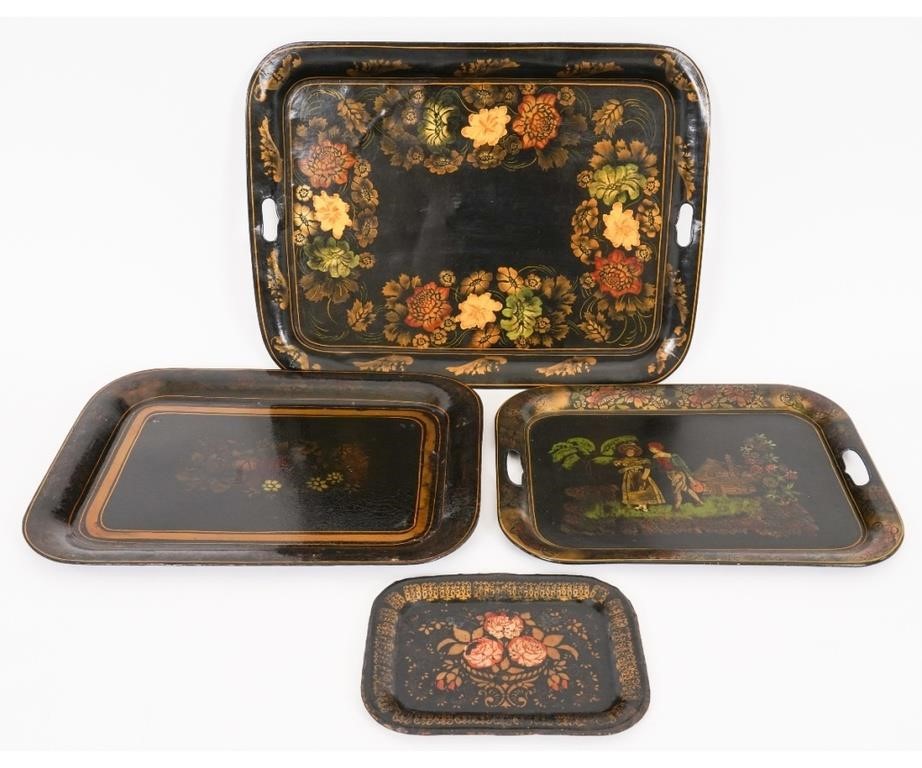 Appraisal: Four Victorian black tole stencil decorated trays Largest l x