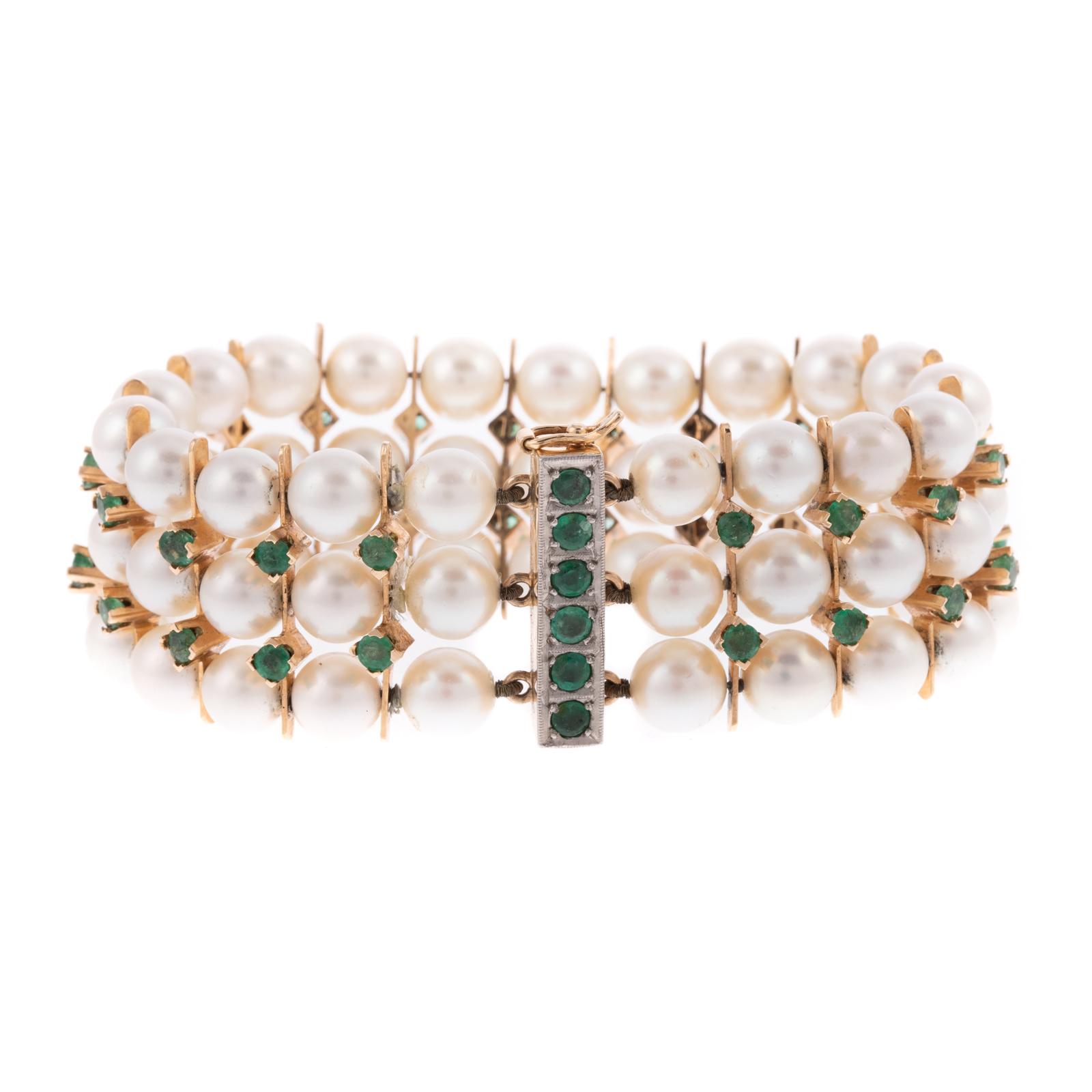 Appraisal: A TRIPLE STRAND PEARL EMERALD BRACELET K yellow gold three